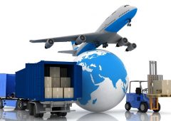 airliner with a globe and autoloader with boxes in a container